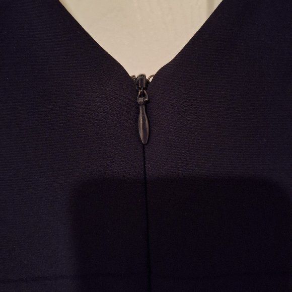 Navy Blue Tea Length Dress with Mesh Cut Outs and Floral Skirt - Picture 7 of 9